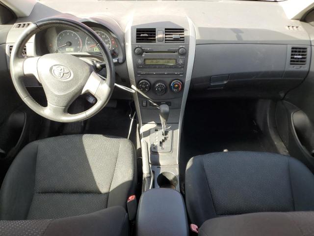 1NXBU40E99Z087768 - 2009 TOYOTA COROLLA BASE Rot Foto 8