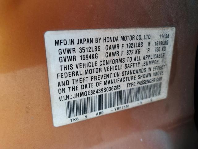 JHMGE88439S036285 - 2009 HONDA FIT SPORT ORANGE photo 12