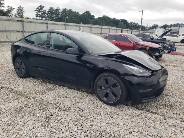 5YJ3E1EA8PF452568 - 2023 TESLA MODEL 3 Schwarz Foto 4