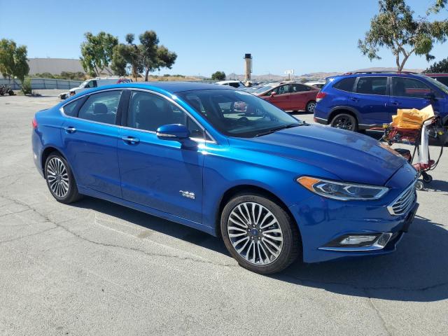 3FA6P0SU0HR354608 - 2017 FORD FUSION TITANIUM PHEV ლურჯი ფოტო 4