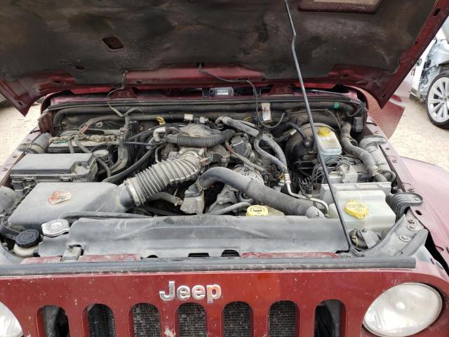 1J4GA59189L762812 - 2009 JEEP WRANGLER U SAHARA RED photo 11