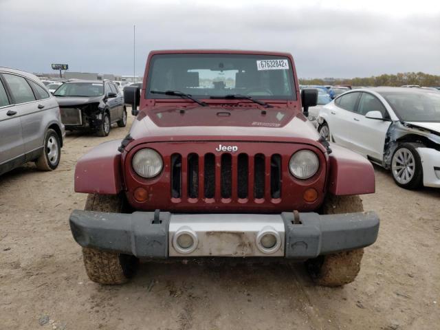 1J4GA59189L762812 - 2009 JEEP WRANGLER U SAHARA RED photo 5