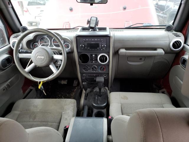 1J4GA59189L762812 - 2009 JEEP WRANGLER U SAHARA RED photo 8