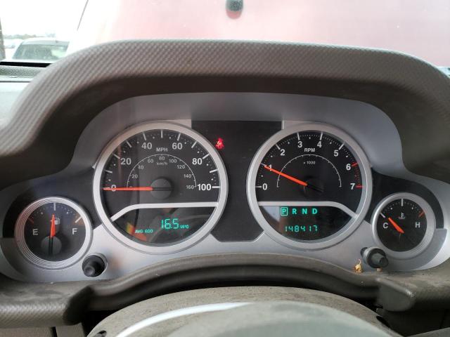 1J4GA59189L762812 - 2009 JEEP WRANGLER U SAHARA RED photo 9