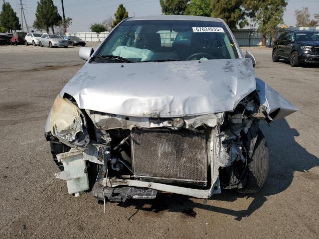 JTKKT624540049390 - 2004 TOYOTA SCION XA SILVER photo 5