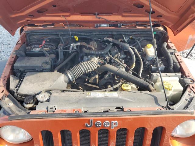 1J4BA3H1XBL583192 - 2011 JEEP WRANGLER U SPORT ORANGE photo 12