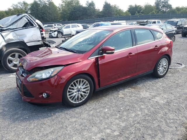 1FADP3N22EL395898 - 2014 FORD FOCUS TITANIUM RED photo 1