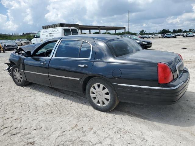 1LNHM84W94Y668855 - 2004 LINCOLN TOWN CAR EXECUTIVE L BLACK photo 2