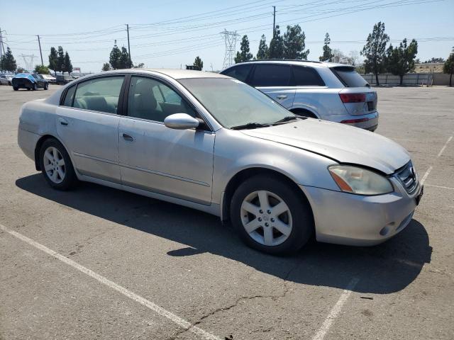 1N4AL11D63C279028 - 2003 NISSAN ALTIMA BASE SILVER photo 4