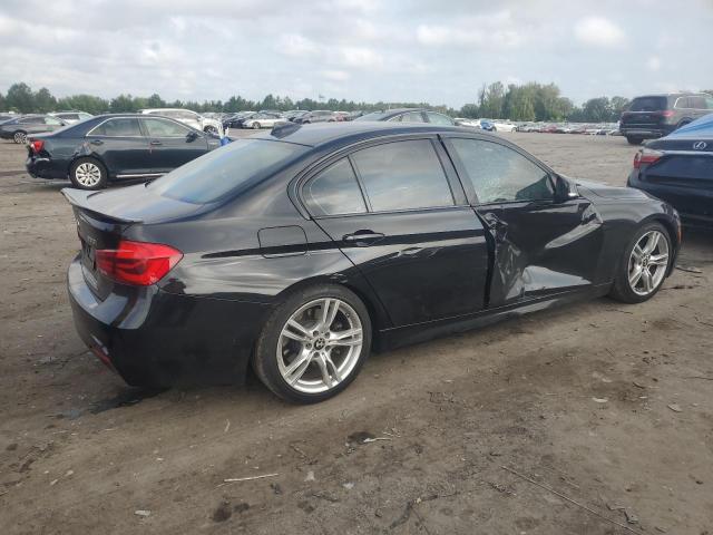 WBA8D9G52JNU72022 - 2018 BMW 330 XI BLACK photo 3