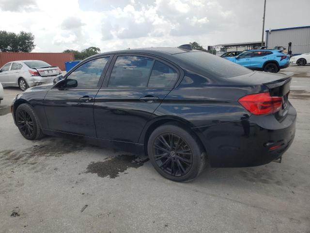 WBA8E5G53HNU22519 - 2017 BMW 320 XI BLACK photo 2