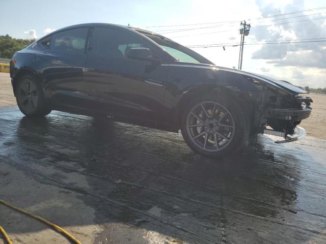 5YJ3E1EA1PF458230 - 2023 TESLA MODEL 3 Czarny zdjęcie 4