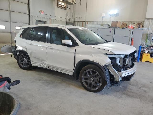 5FNYF8H57PB014179 - 2023 HONDA PASSPORT EXL WHITE photo 4