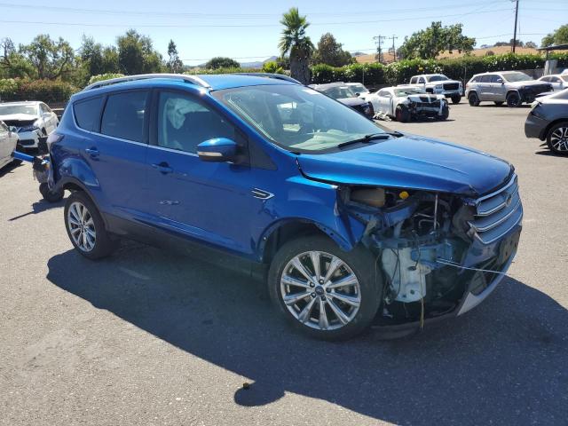 1FMCU0J95HUA23434 - 2017 FORD ESCAPE TITANIUM BLUE photo 4