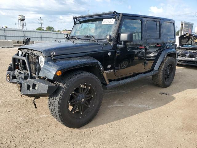 1J4HA7H11BL610264 - 2011 JEEP WRANGLER U JEEP 70TH ANNIVERSARY BLACK photo 1