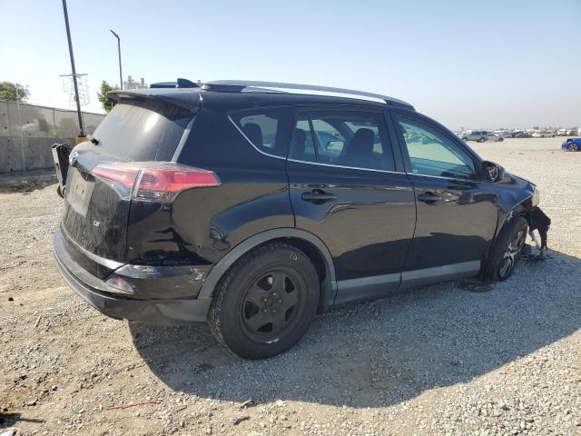 2T3ZFREV5JW484565 - 2018 TOYOTA RAV4 LE Siyah fotoğraf 3
