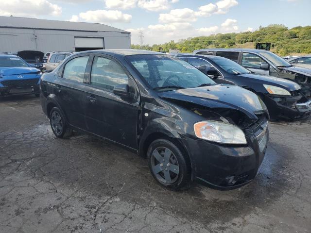 KL1TD56697B047477 - 2007 CHEVROLET AVEO BASE BLACK photo 4