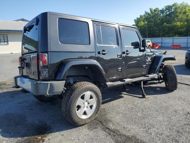 1J4GA59129L774549 - 2009 JEEP WRANGLER U SAHARA BLACK photo 3