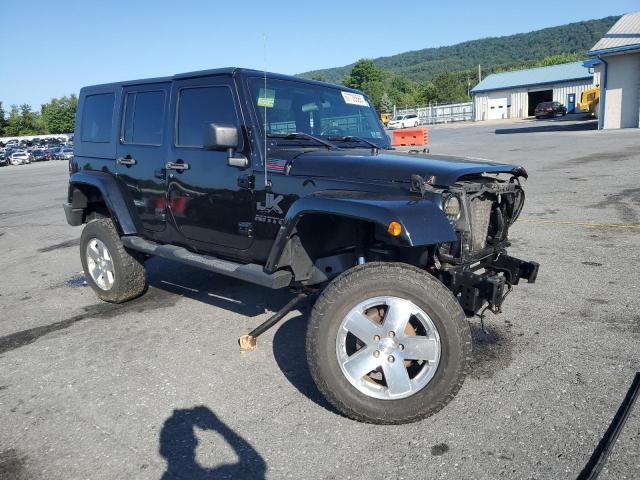 1J4GA59129L774549 - 2009 JEEP WRANGLER U SAHARA BLACK photo 4