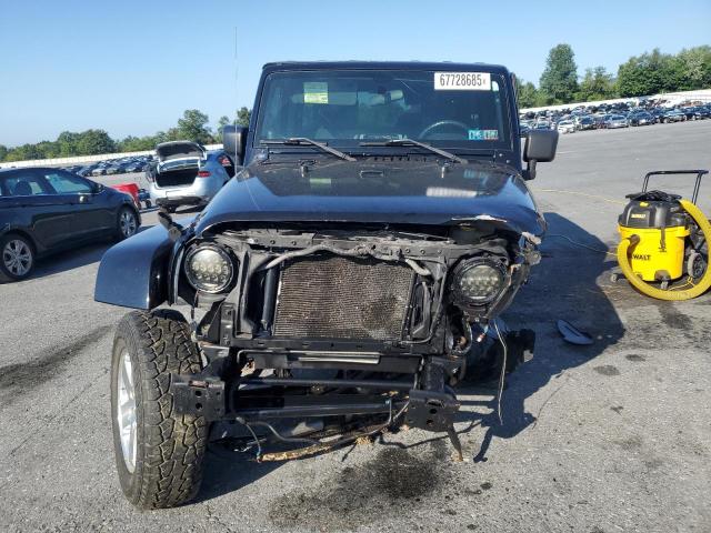 1J4GA59129L774549 - 2009 JEEP WRANGLER U SAHARA BLACK photo 5