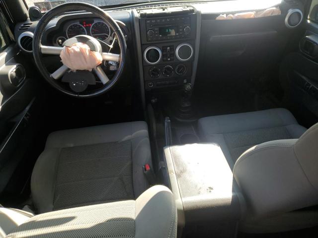 1J4GA59129L774549 - 2009 JEEP WRANGLER U SAHARA BLACK photo 8