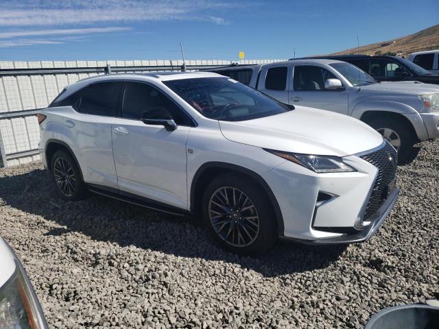 2T2BZMCA3KC196644 - 2019 LEXUS RX 350 BASE WHITE photo 4