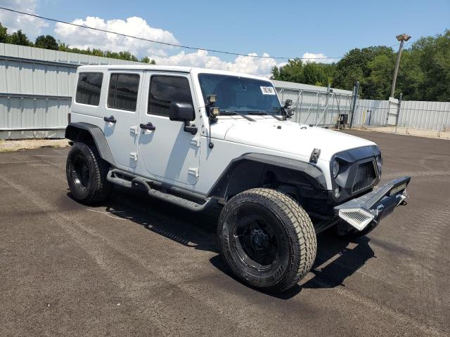 1C4BJWEG5FL690544 - 2015 JEEP WRANGLER U SAHARA WHITE photo 4