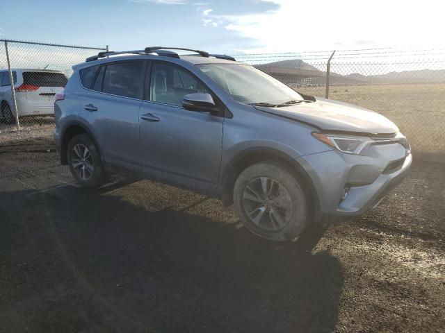 2T3WFREV0JW443439 - 2018 TOYOTA RAV4 ADVENTURE SILVER photo 4