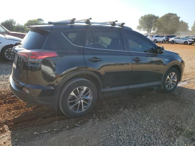 JTMRJREV8JD215570 - 2018 TOYOTA RAV4 HV LE BLACK photo 3