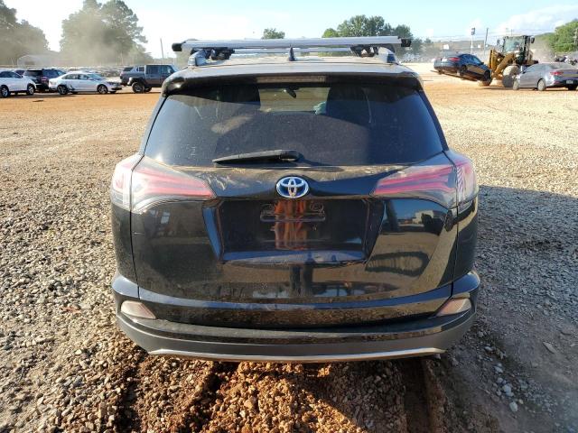 JTMRJREV8JD215570 - 2018 TOYOTA RAV4 HV LE BLACK photo 6