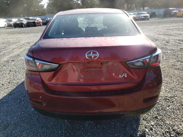 3MYDLBZV3GY103269 - 2016 TOYOTA SCION IA BURGUNDY photo 6