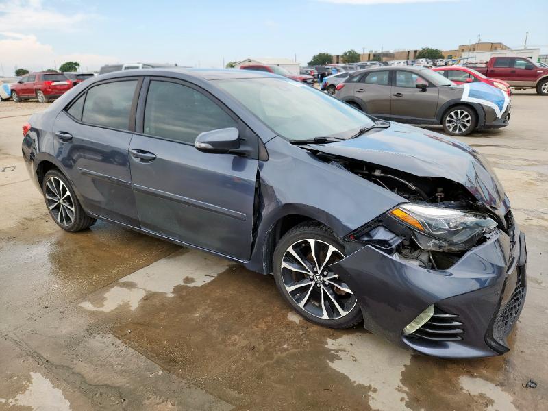 5YFBURHE6JP750690 - 2018 TOYOTA COROLLA L BLUE photo 4