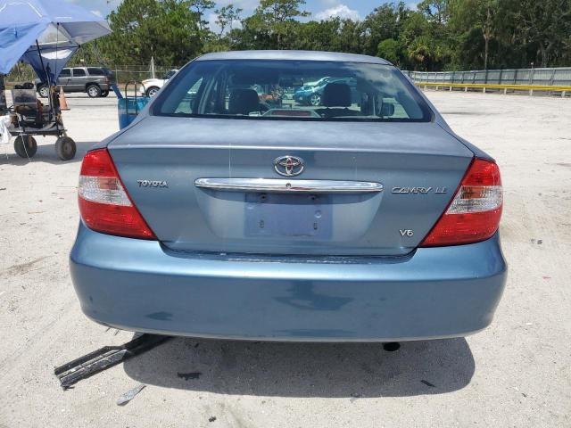 4T1BF30K04U571329 - 2004 TOYOTA CAMRY LE 蓝色 照片 6
