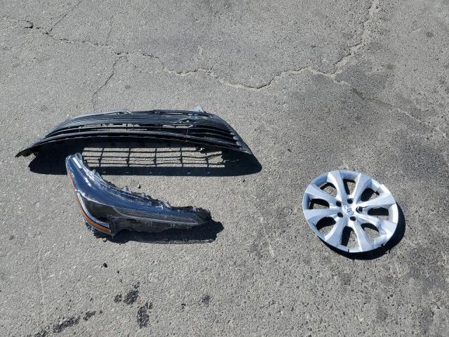 5YFB4MDE3SP334509 - 2025 TOYOTA COROLLA LE SILVER photo 12