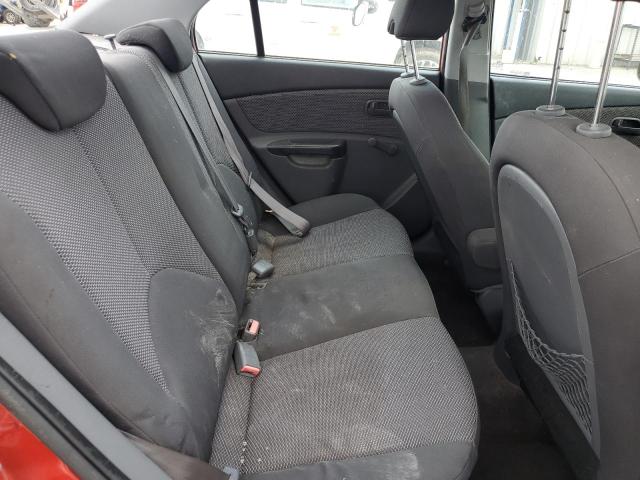 KNADH4A33B6738205 - 2011 KIA RIO BASE RED photo 10