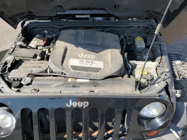 1C4BJWEG2DL687064 - 2013 JEEP WRANGLER U SAHARA შავი ფოტო 12