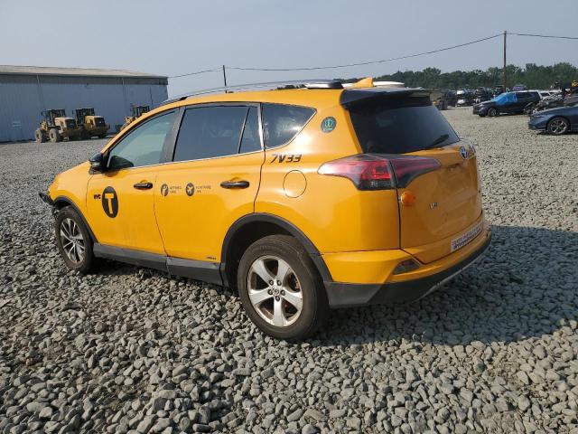 JTMRJREV1HD130046 - 2017 TOYOTA RAV4 HV LE YELLOW photo 2