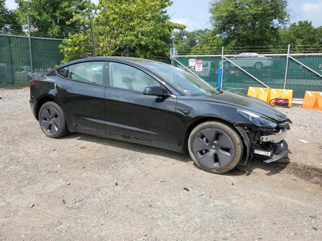 5YJ3E1EA4PF653948 - 2023 TESLA MODEL 3 შავი ფოტო 4