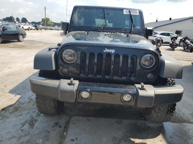 1C4BJWDG4EL113438 - 2014 JEEP WRANGLER U SPORT Schwarz Foto 5