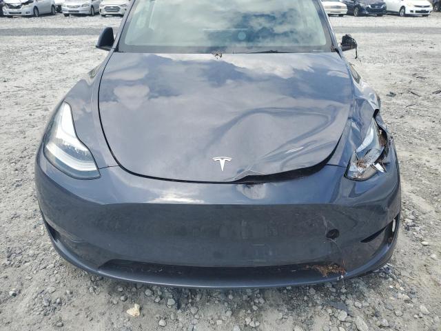 7SAYGDEE0PA155587 - 2023 TESLA MODEL Y ლურჯი ფოტო 11