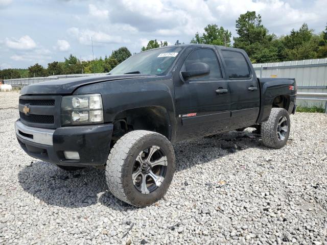 2GCFK13Y871656909 - 2007 CHEVROLET SILVERADO K1500 CREW CAB BLACK photo 1