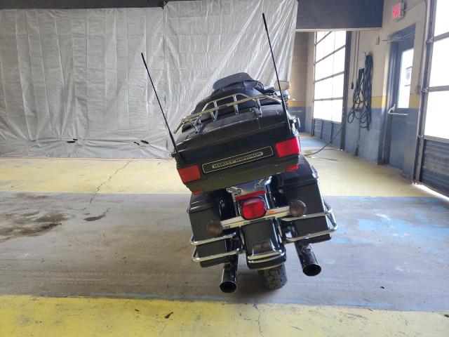 1HD1FC4107Y676143 - 2007 HARLEY-DAVIDSON FLHTCUI BLACK photo 4