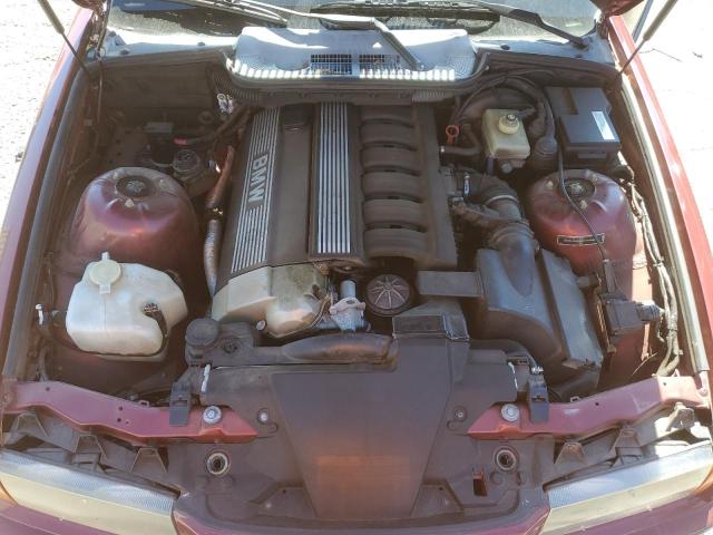 WBABJ6321RJD36723 - 1994 BMW 325 IC AUTOMATIC RED photo 11
