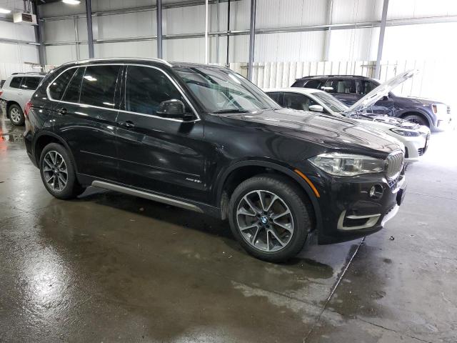 5UXKR0C5XJL073641 - 2018 BMW X5 XDRIVE35I BLACK photo 4