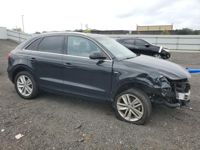 WA1JCCFS3JR031112 - 2018 AUDI Q3 PREMIUM PLUS Schwarz Foto 4