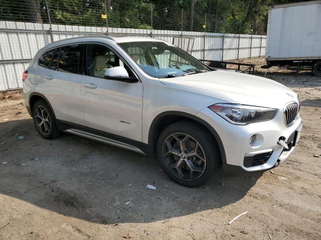 WBXHT3C32J5K25433 - 2018 BMW X1 XDRIVE28I WHITE photo 4