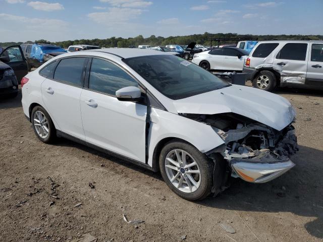 1FADP3F24FL211495 - 2015 FORD FOCUS SE WHITE photo 4