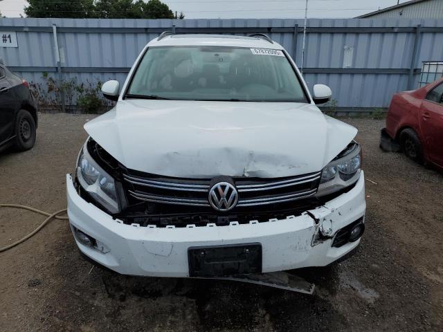 WVGJV3AX1EW576957 - 2014 VOLKSWAGEN TIGUAN S WHITE photo 5