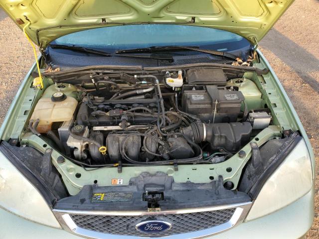 1FAFP34NX7W113545 - 2007 FORD FOCUS ZX4 GREEN photo 11