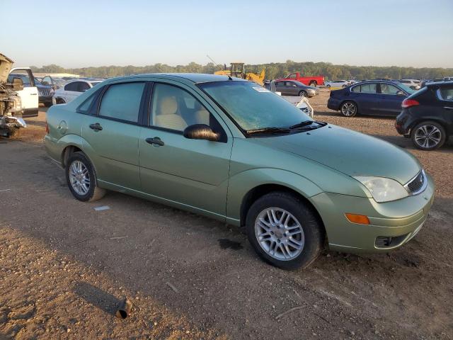 1FAFP34NX7W113545 - 2007 FORD FOCUS ZX4 GREEN photo 4